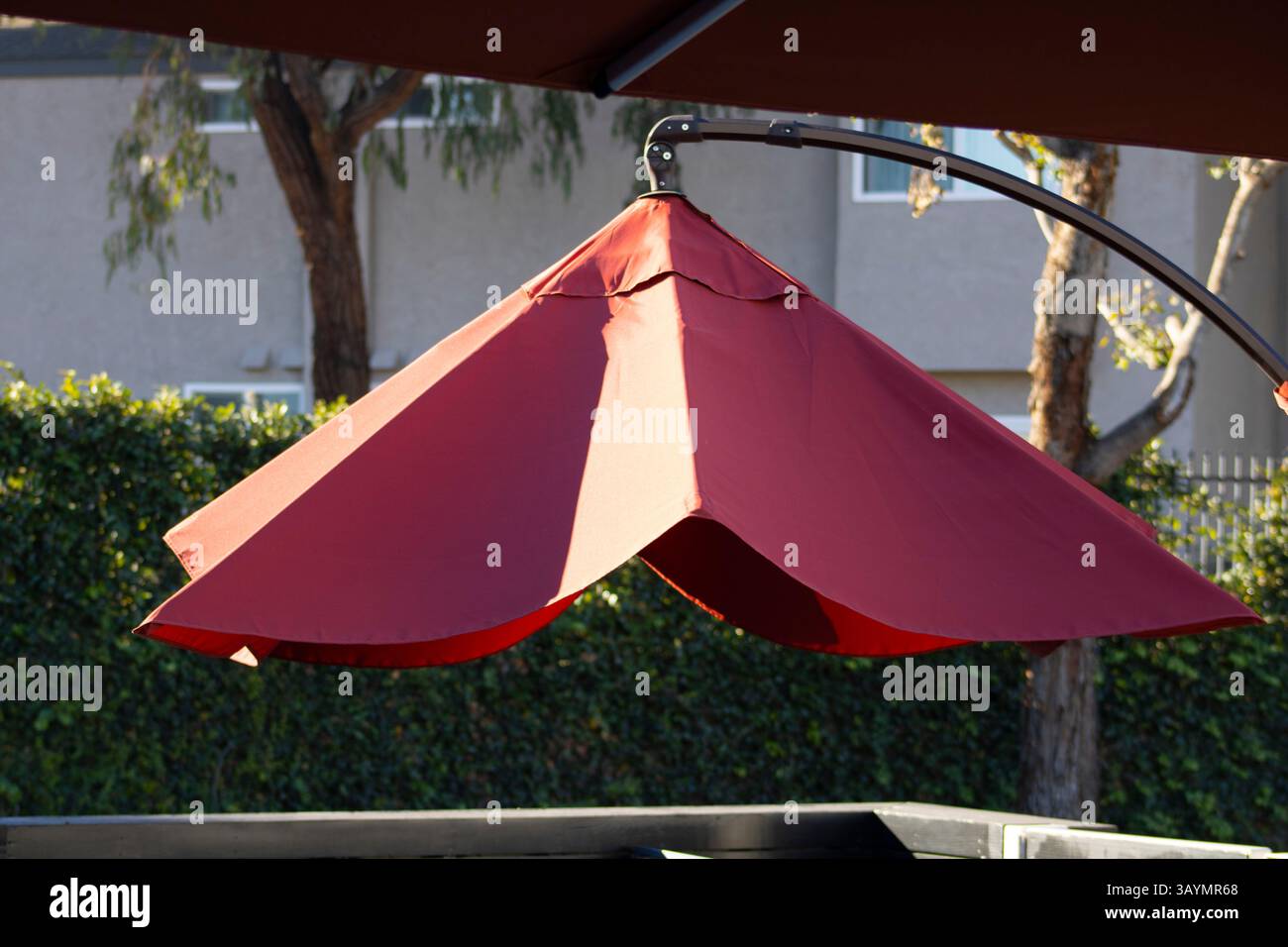 red table umbrella hanging in suspension Stock Photo - Alamy
