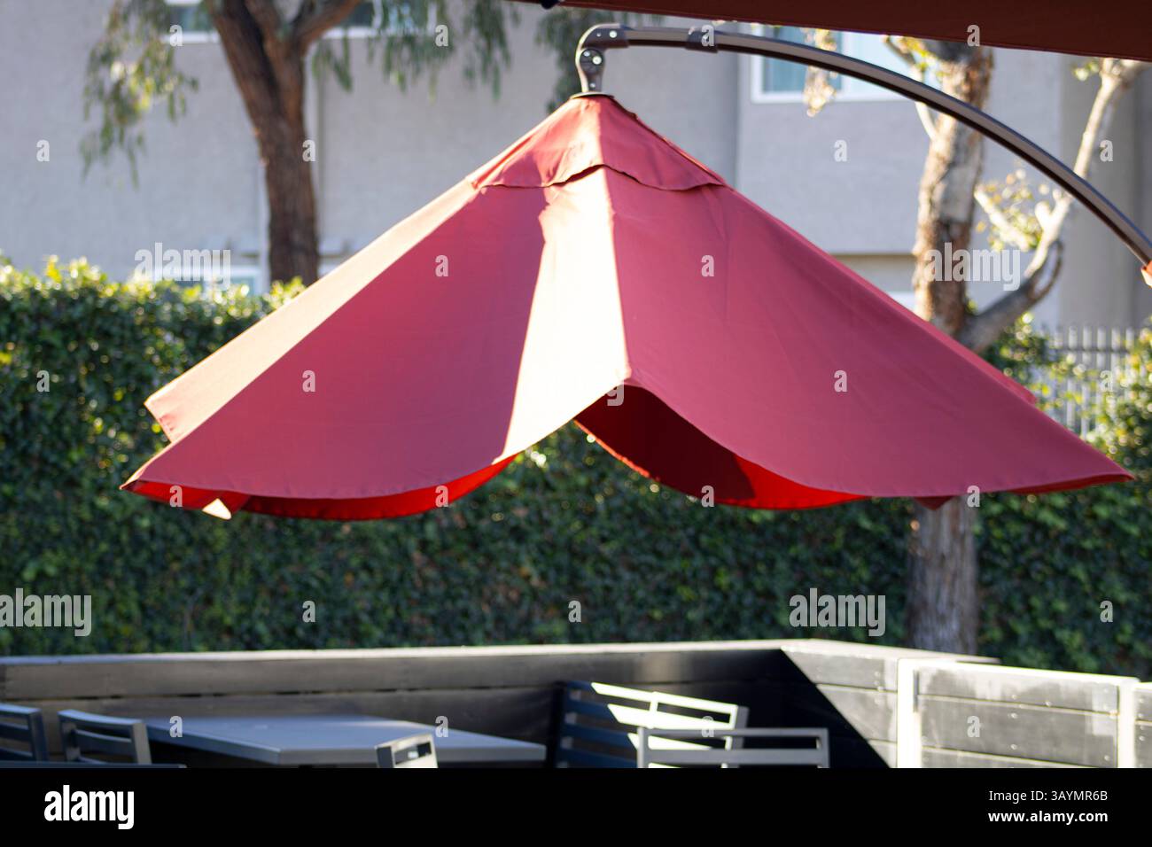 red table umbrella hanging in suspension Stock Photo - Alamy
