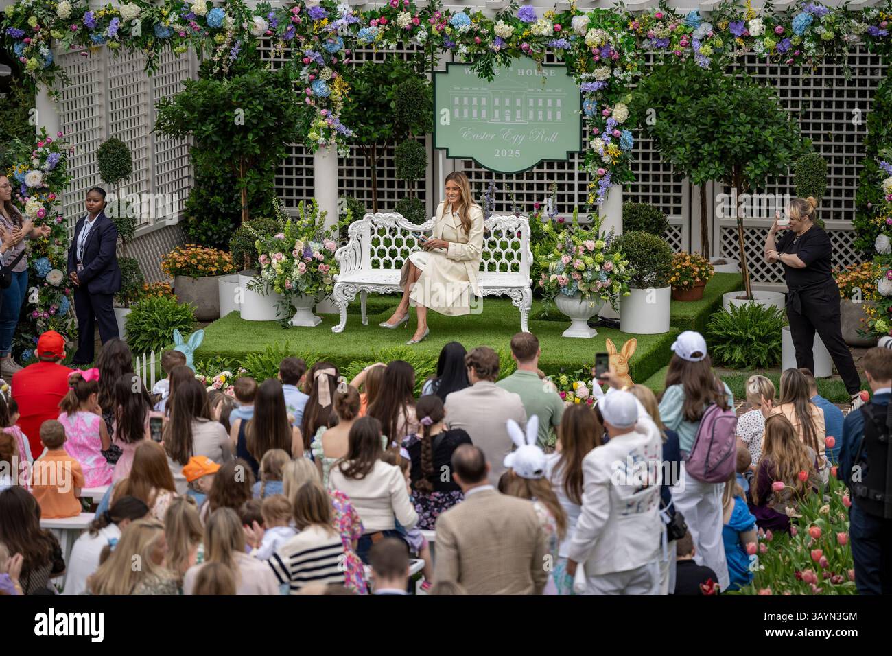 First Lady Melania Trump reads a book at the Reading Nook in the First