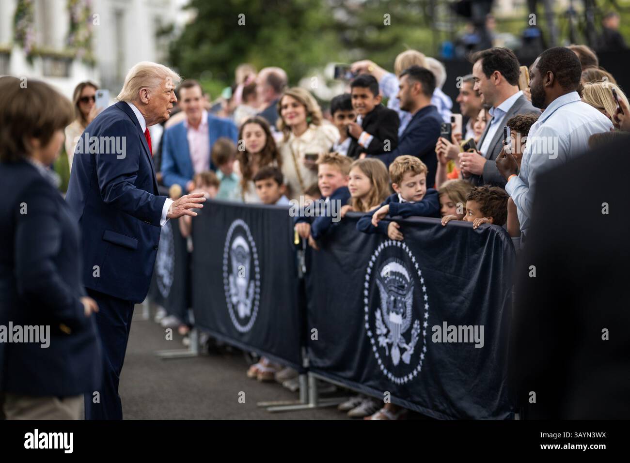 President Donald Trump departs the White House Easter Egg Roll on the ...