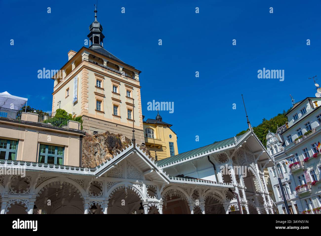 Colourful houses and castle tower at Karlovy Vary, Czech republic.IMAGE Stock Photo
