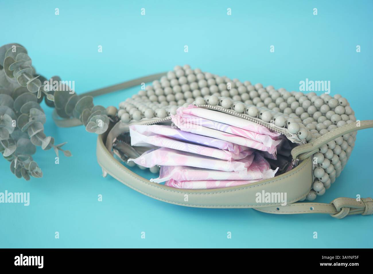 bag filled with feminine hygiene products, Women sanitary napkin Stock Photo