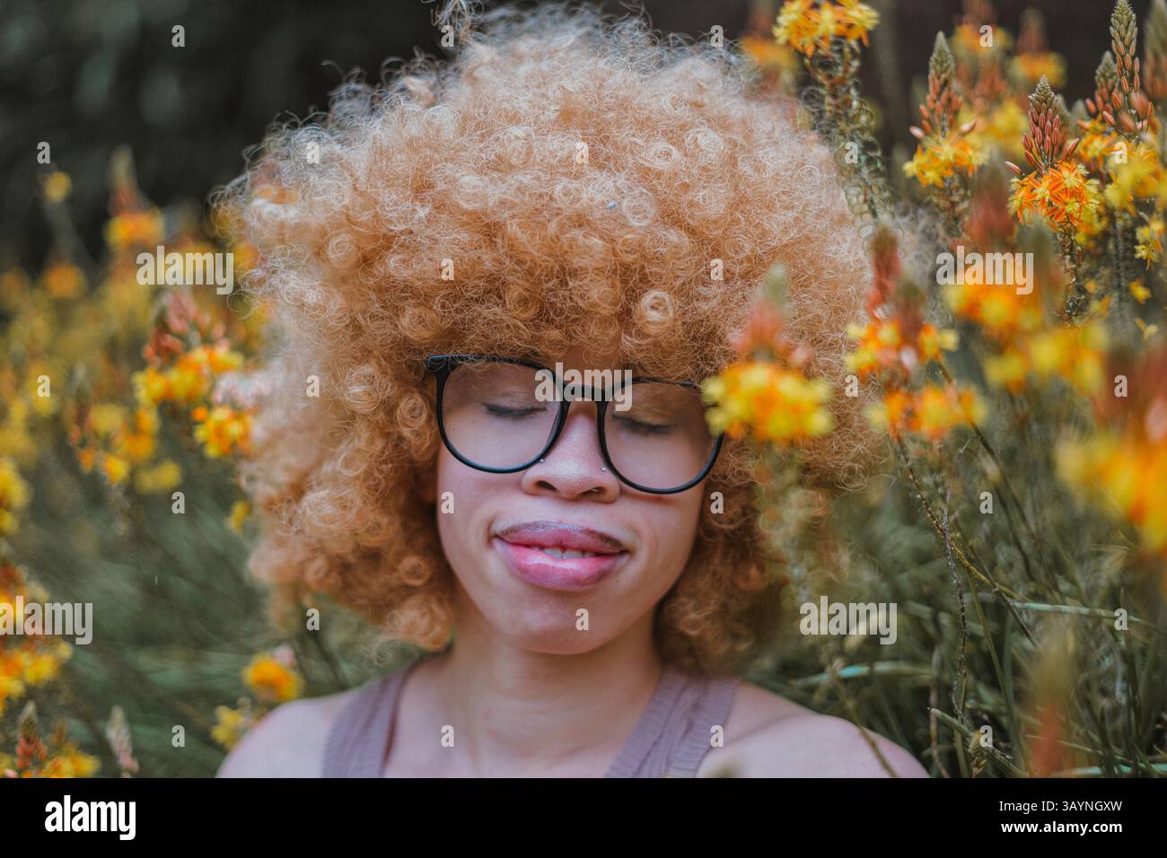 Woman curly hair glasses hi-res stock photography and images - Alamy