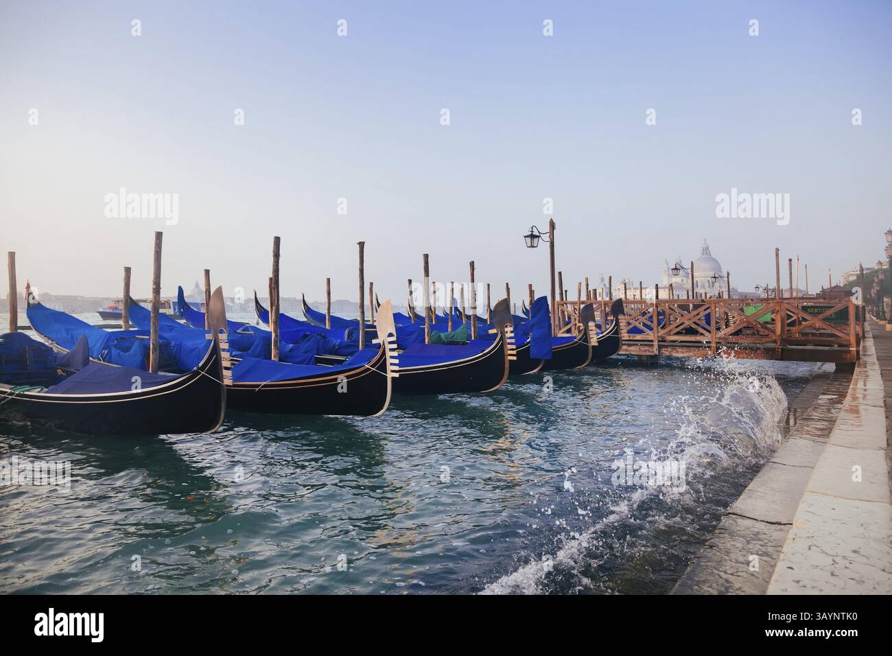 Venetian gondolas at sunrise in venice, Italy, Europe Stock Photo - Alamy