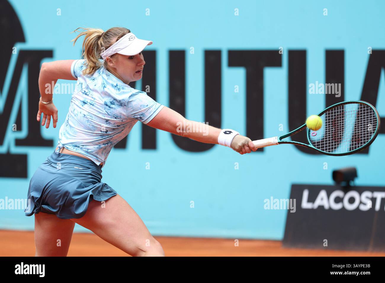 Anna Blinkova of Russia in action against Kaitlin Quevedo of Spain during the Mutua Madrid Open 2025, ATP Masters 1000 and WTA 1000, tennis tournament on 22 April 2025 at Caja Magica in Madrid, Spain Stock Photo
