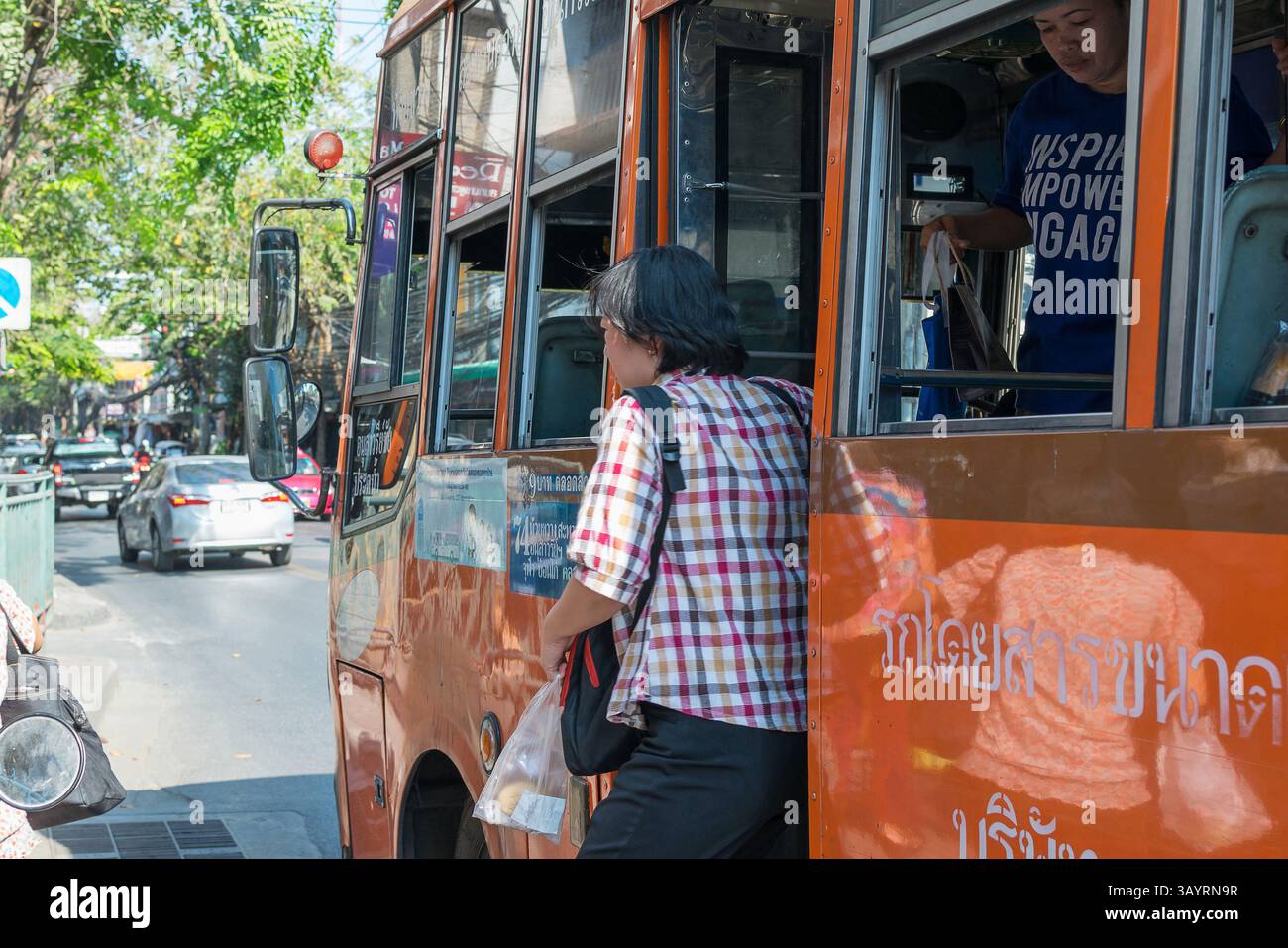 Bangkok, Thailand - March 15, 2016 : Unidentified people travel by bus ...