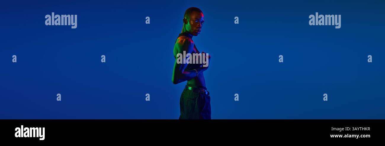 A young african american man poses confidently in stylish attire with ...