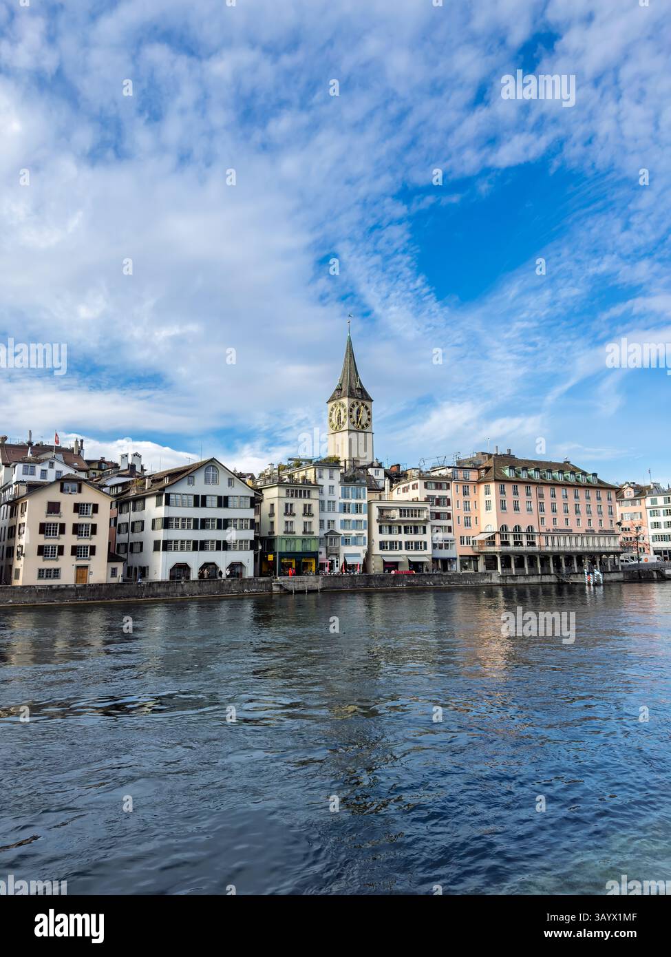 Historic Zurich Waterfront with St. Peter Church Tower and Limmat River ...