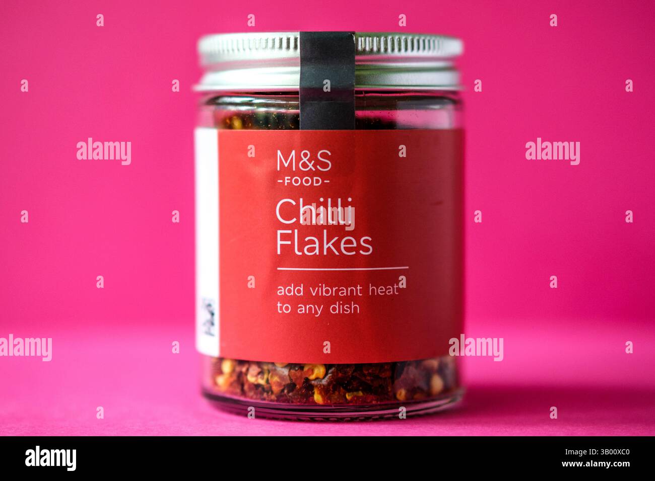 London UK, April 23 2025, Marks and Spencer Spicy Chilli flakes Cooking Ingredient Stock Photo
