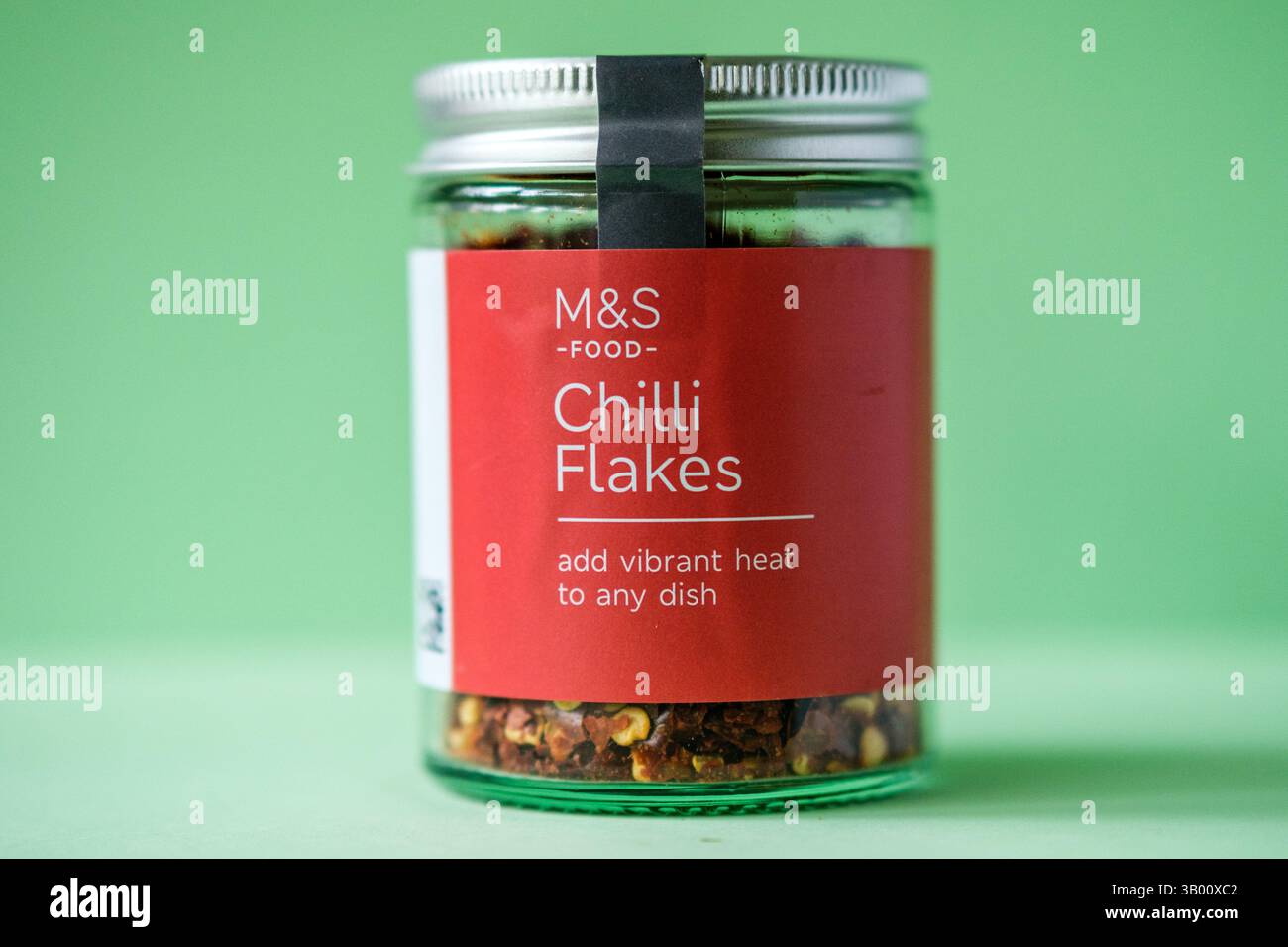 London UK, April 23 2025, Marks and Spencer Spicy Chilli flakes Cooking Ingredient Stock Photo