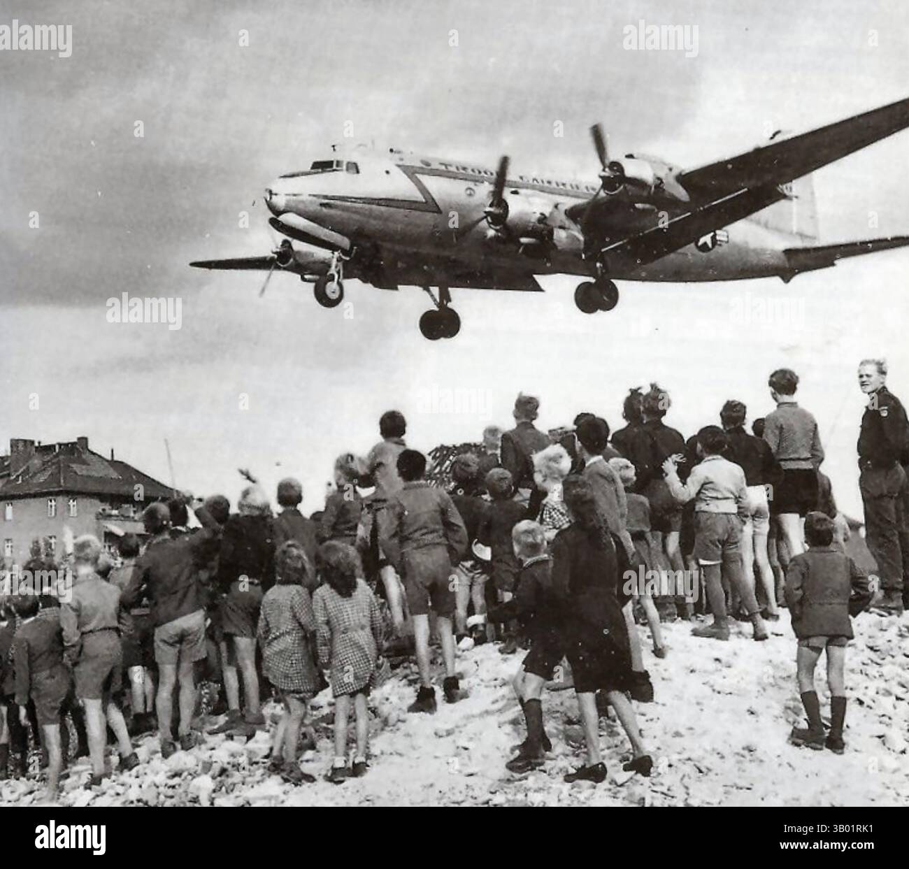 BERLIN AIRLIFT ACrowds Watch As A Douglas C 54 Skymaster Lands At BERLIN AIRLIFT ACrowds Watch As A Douglas C 54 Skymaster Lands At