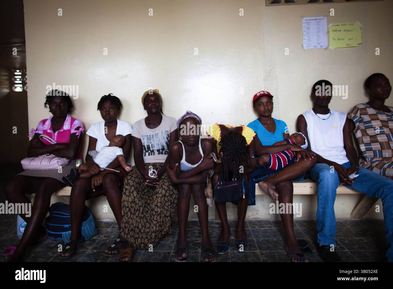 Feb 26, 2010 - Saint-Marc, Artibonite, Haiti - Patients wait to be treated at the YWAM clinic. The new YWAM clinic opened just after the earthquake. It used to be an abortion and euthenasia clinic. When YWAM took over the facilities they had to clean out human waste a foot deep. The locals were using it as their bathroom. (Credit Image: © George Hsia/ZUMApress.com) Stock Photo