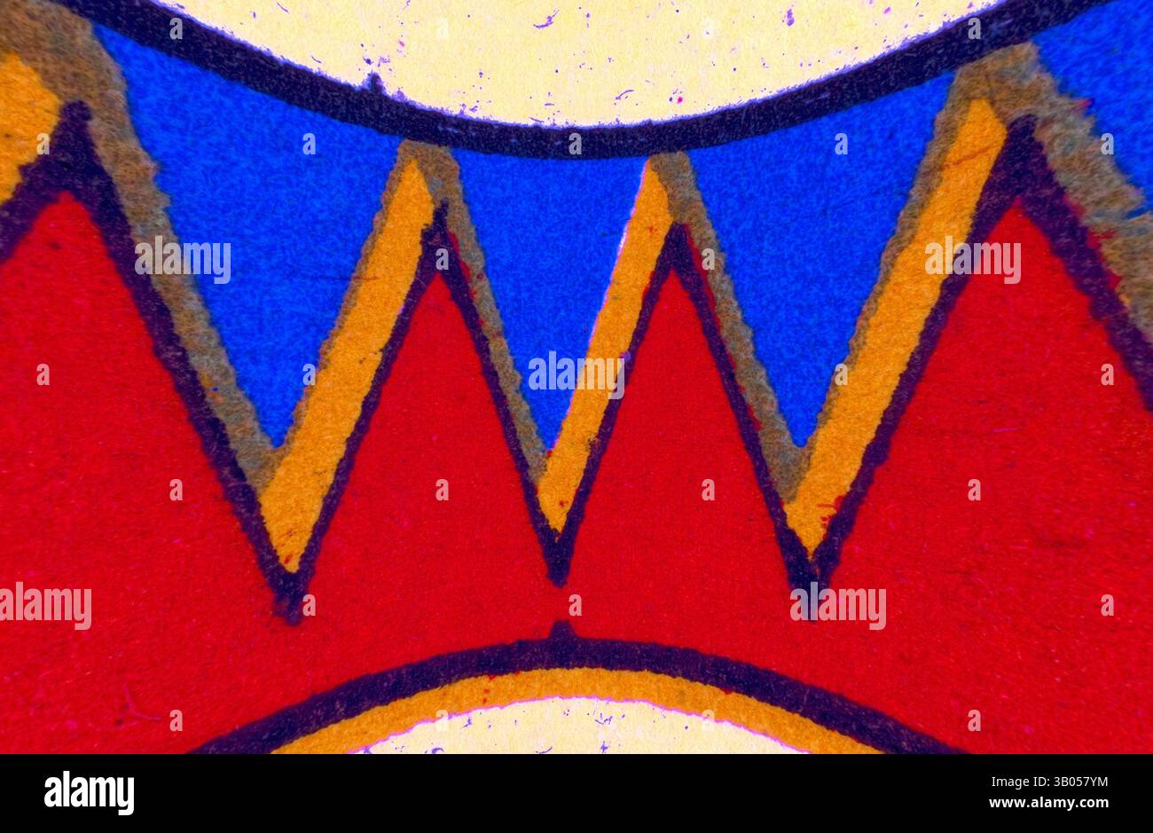 A vibrant pattern featuring sharp, zigzag shapes in red, blue, and ...