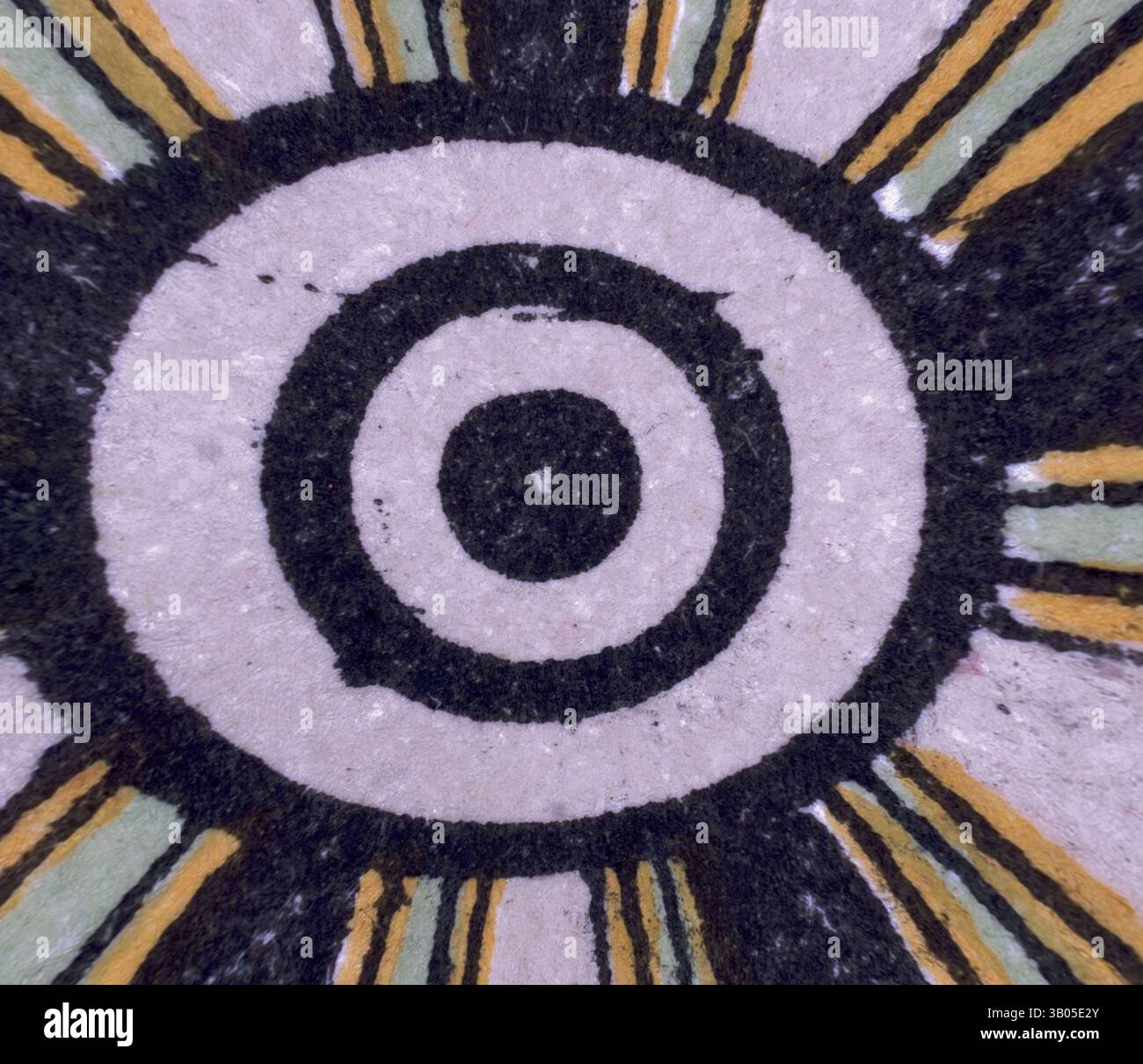 A circular pattern featuring concentric circles in bold black ...