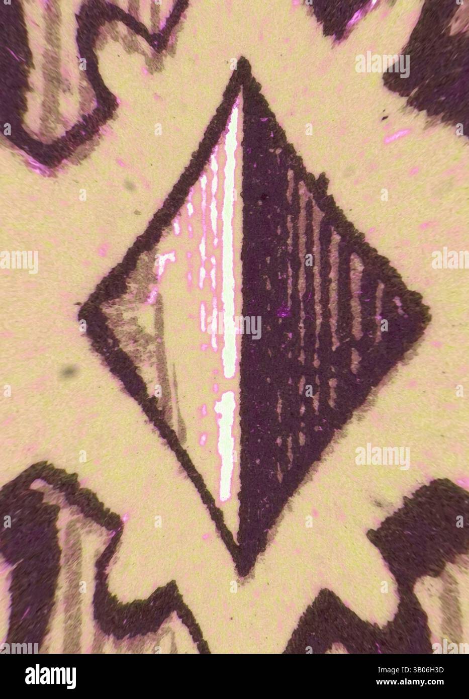 A geometric pattern features a central diamond shape, divided into ...