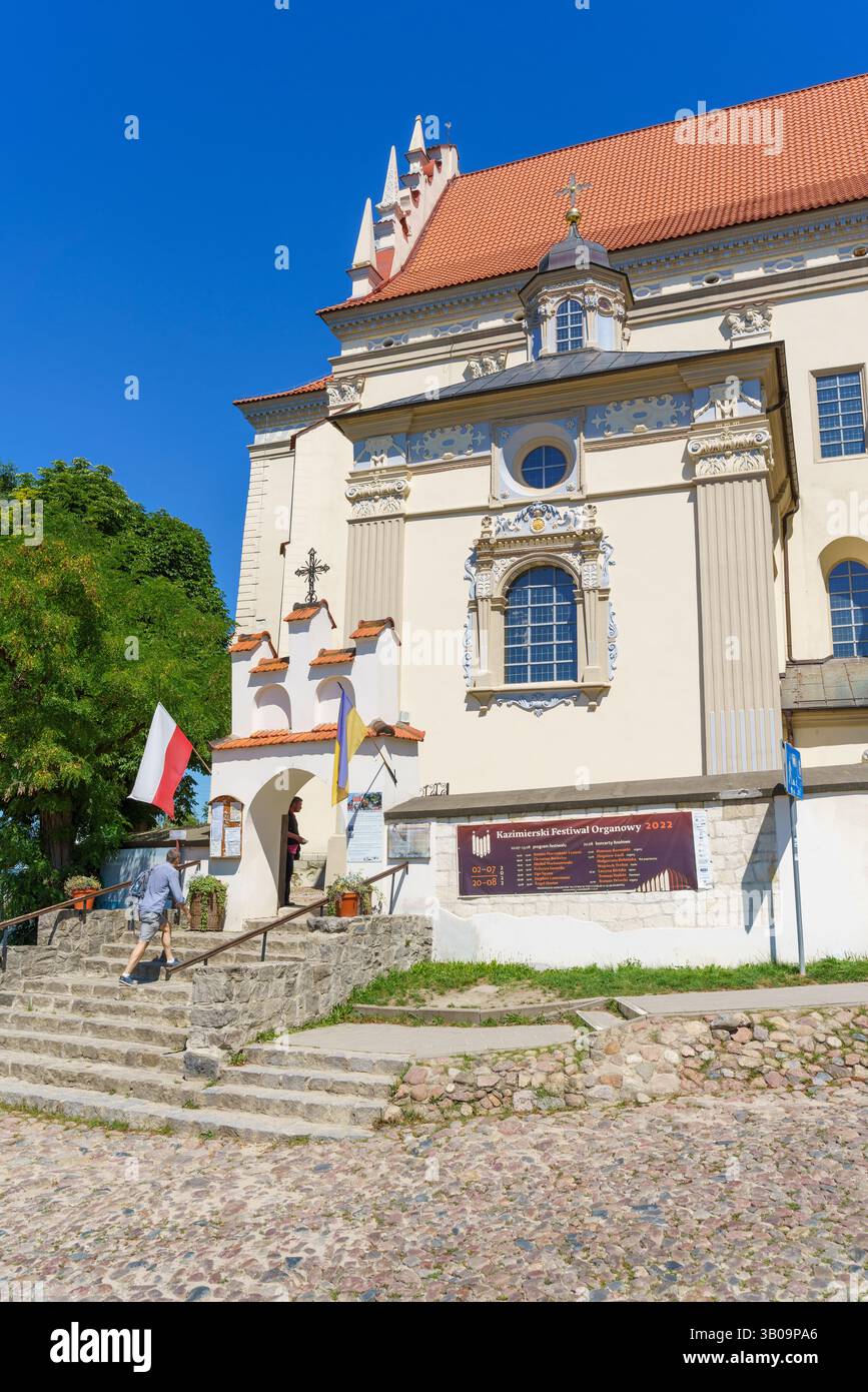 Kazimierz Dolny, historic small town in eastern Poland, on the bank of the Vistula river. Beautiful renaissance church near market square. Poland. Stock Photo