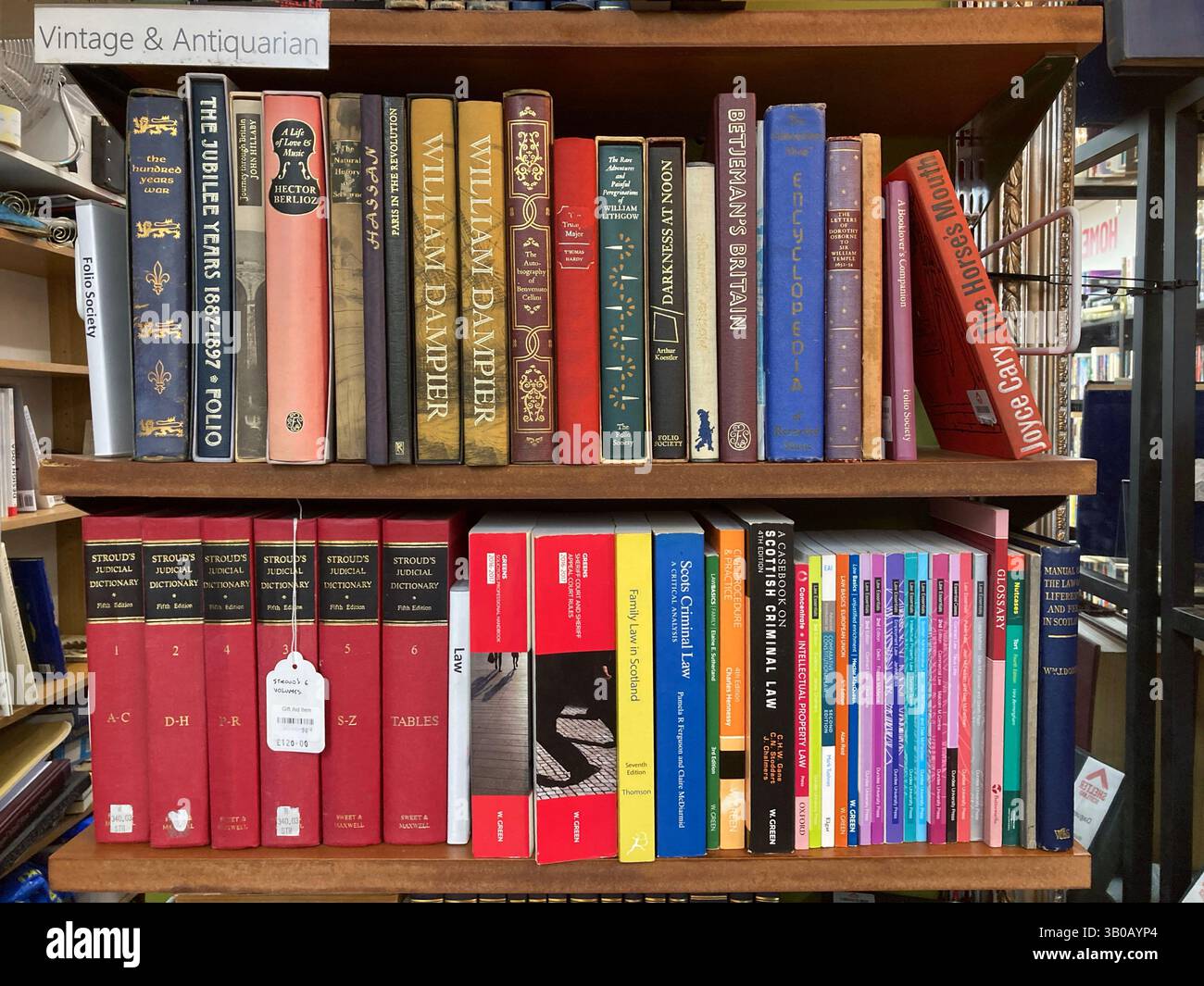 Vintage and Antiquarian books for sale in charity shop - Smartphone Captured Stock Image