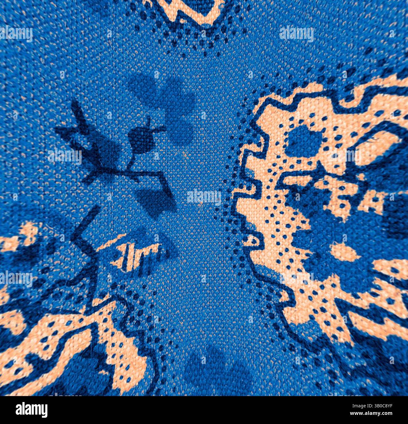 A vibrant textile featuring intricate patterns in deep blue and ...