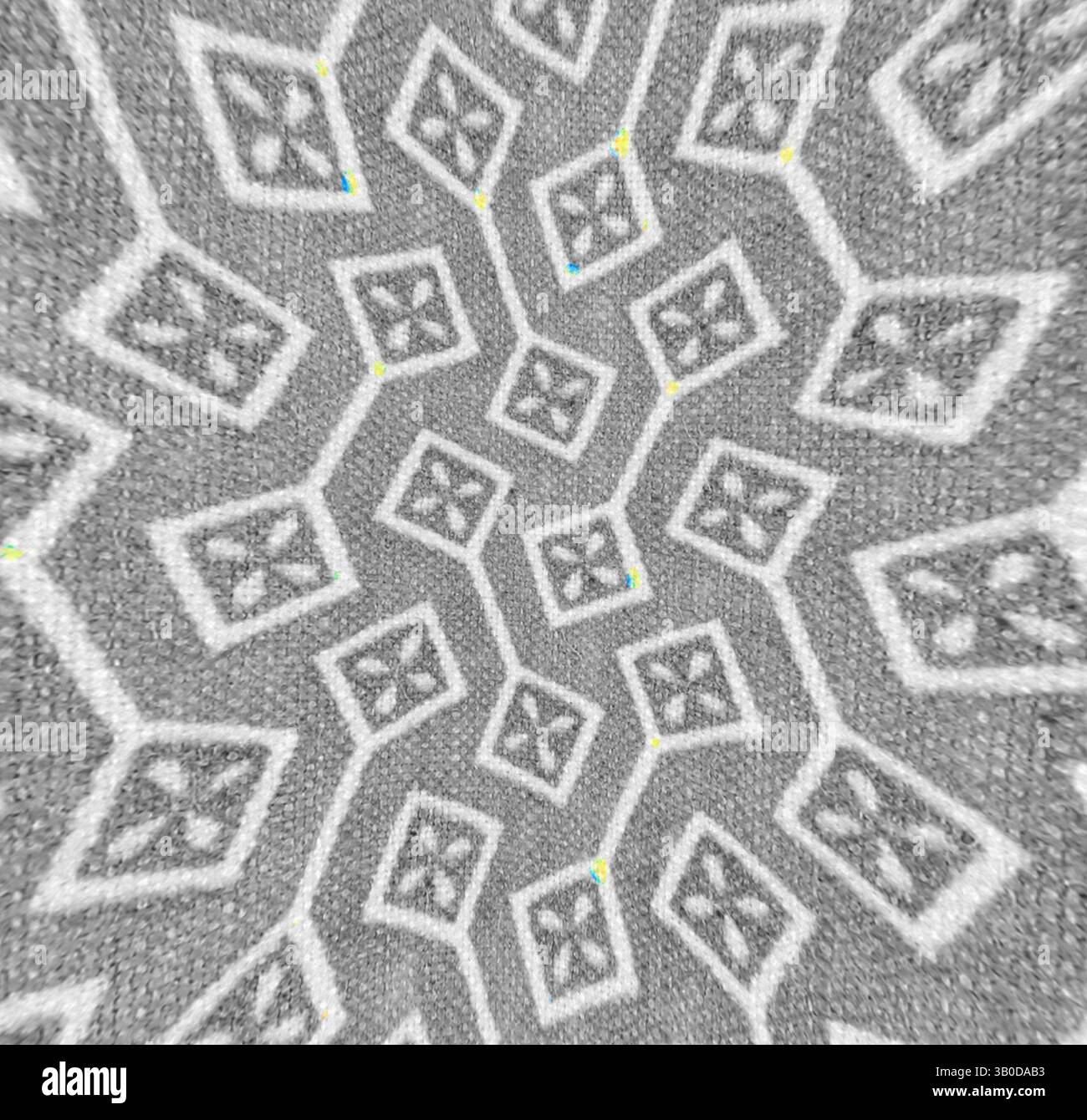 A complex geometric pattern featuring interlocking shapes and intricate ...