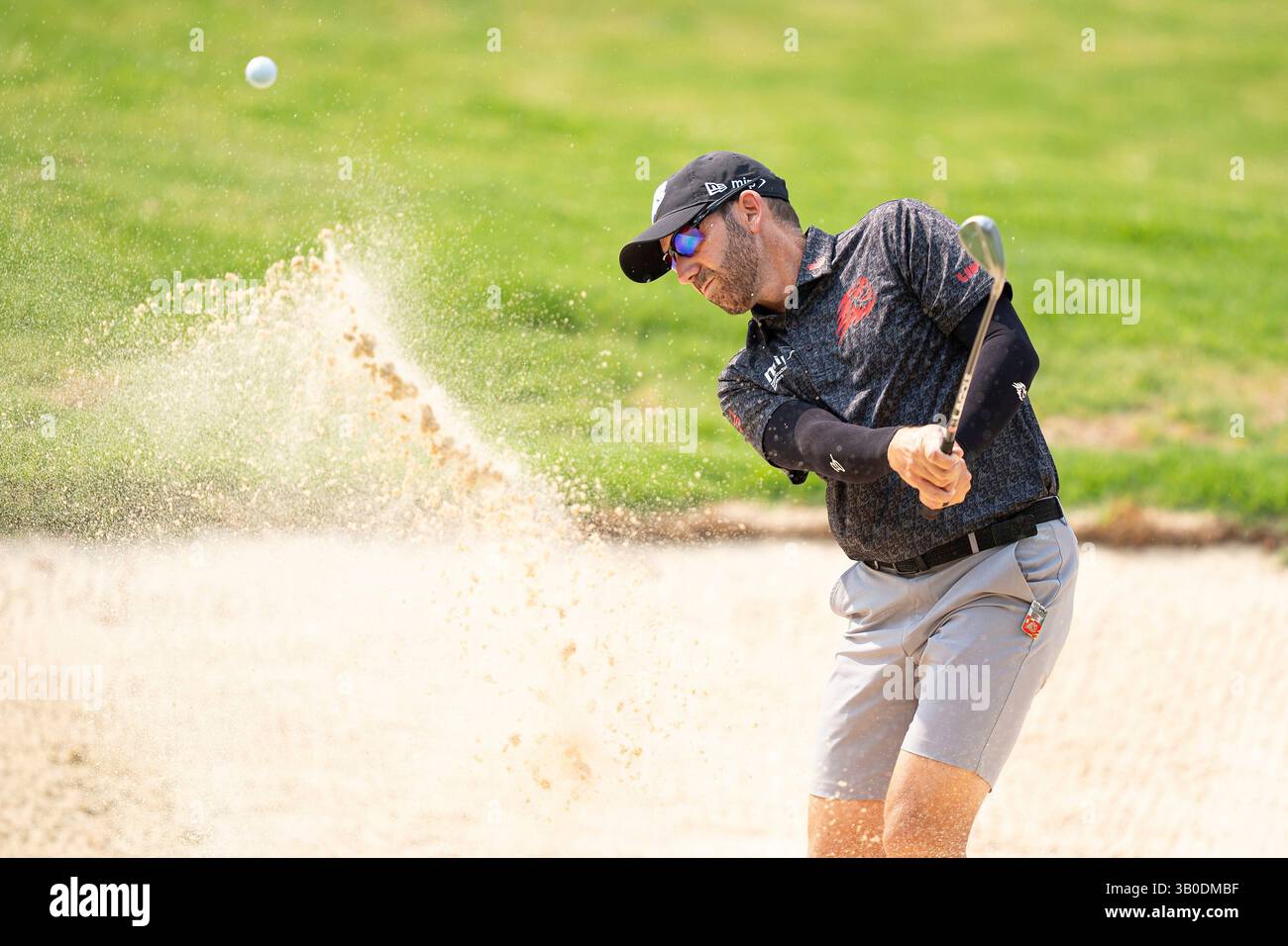 Captain Sergio Garcia of Fireballs GC hits his shot from a bunker on ...
