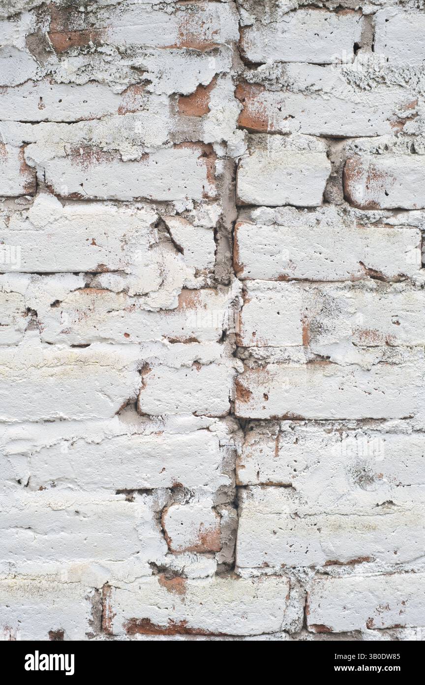 A Whitewashed Brick Wall Featuring a Rustic and Charming Texture for Visual Appeal Stock Photo