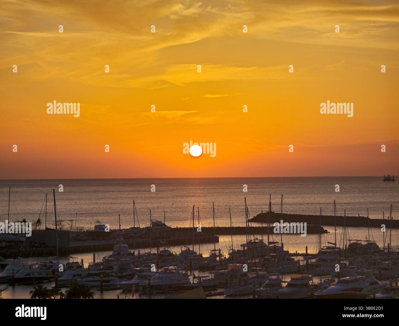 A dreamy sunset over the marina in Ginowan, Okinawa, Japan. - Smartphone Captured Stock Image