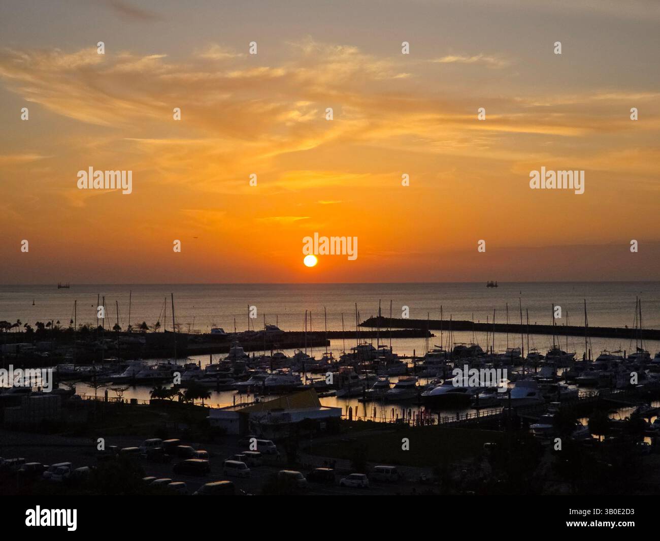 A dreamy sunset over the marina in Ginowan, Okinawa, Japan. - Smartphone Captured Stock Image