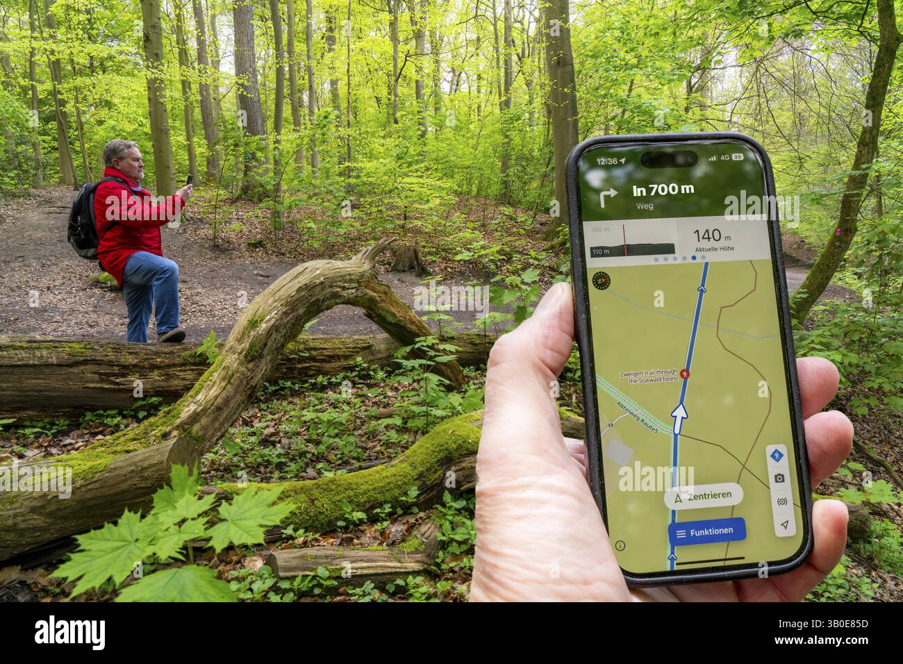 Symbolic image Hiking with smartphone and hiking app, navigation on ...