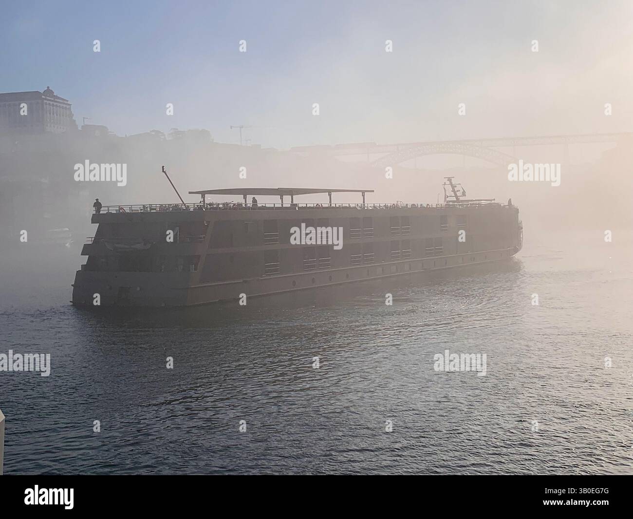 Doro Portugal river cruise cruising ship mist fog land Porto fields wine port water lake land landscape vineyard vineyards grapes grape vines trees - Smartphone Captured Stock Image