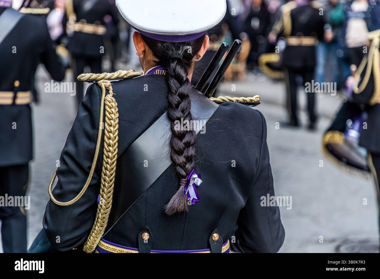 Musician in uniform at a ceremony in Spain. Calle Alfonso VIII, Cuenca, Castilla-La Mancha, Spain Stock Photo