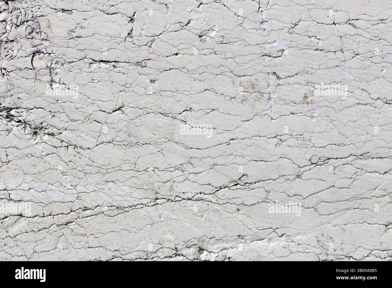 Smooth White Rock Surface with Fine Cracks Stock Photo