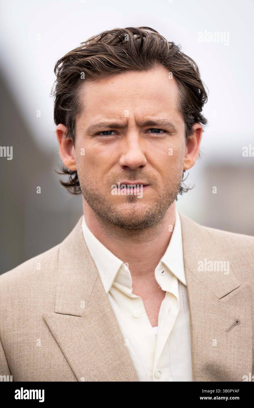 Lewis Pullman poses for photographers at the photo call for the film