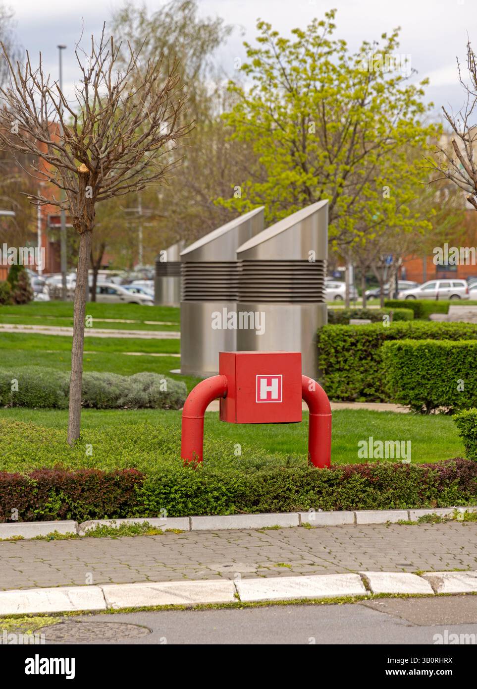 Red Fire Hydrant Box Water Supply at City Park Stock Photo - Alamy