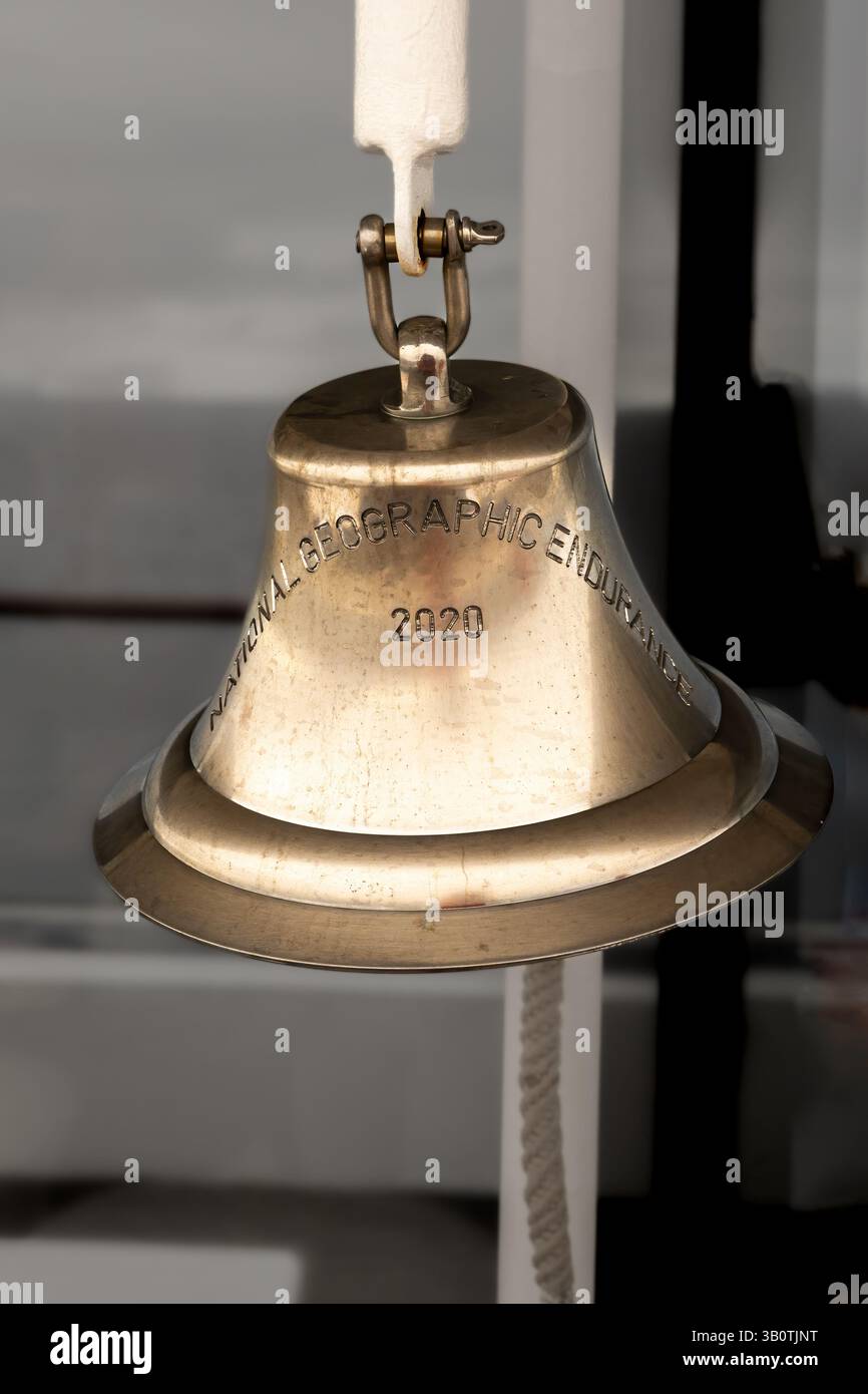 The ship's bell of the Lindblad National Geographic Endurance, an expedition cruise ship commissioned in 2020. . Stock Photo