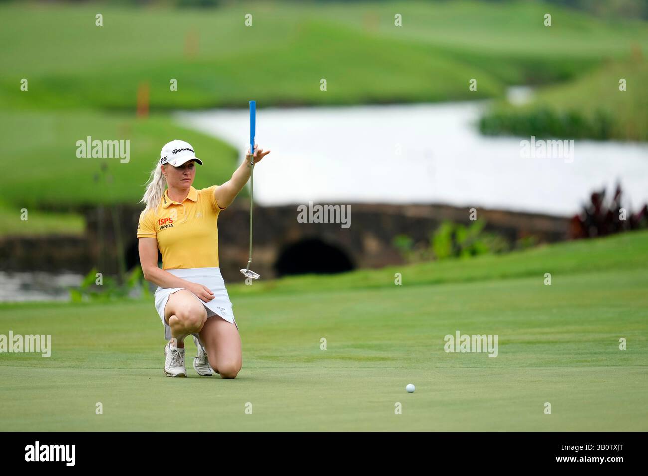 Charley Hull, of England, prepares to putt on the 15th hole during the