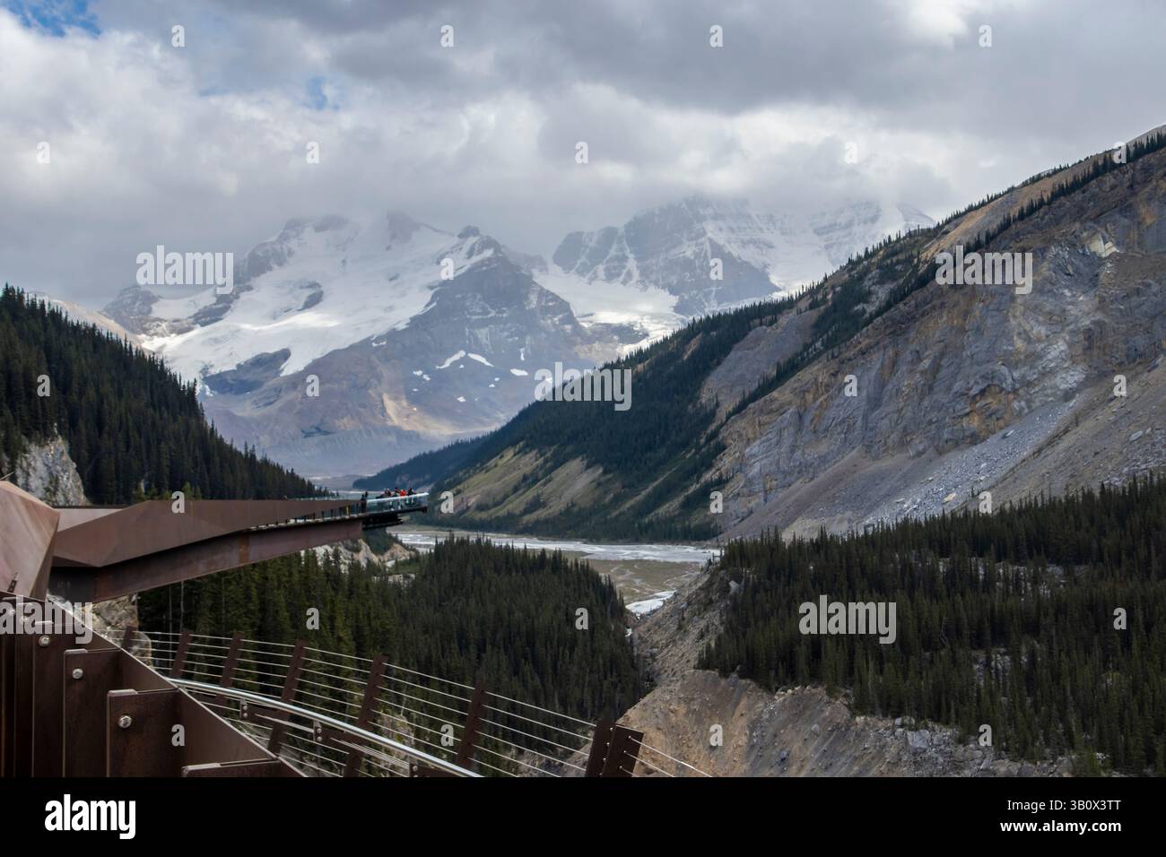 Canadian Viewpoint Visitors enjoy breathtaking views from a cliffside viewpoint in the ...