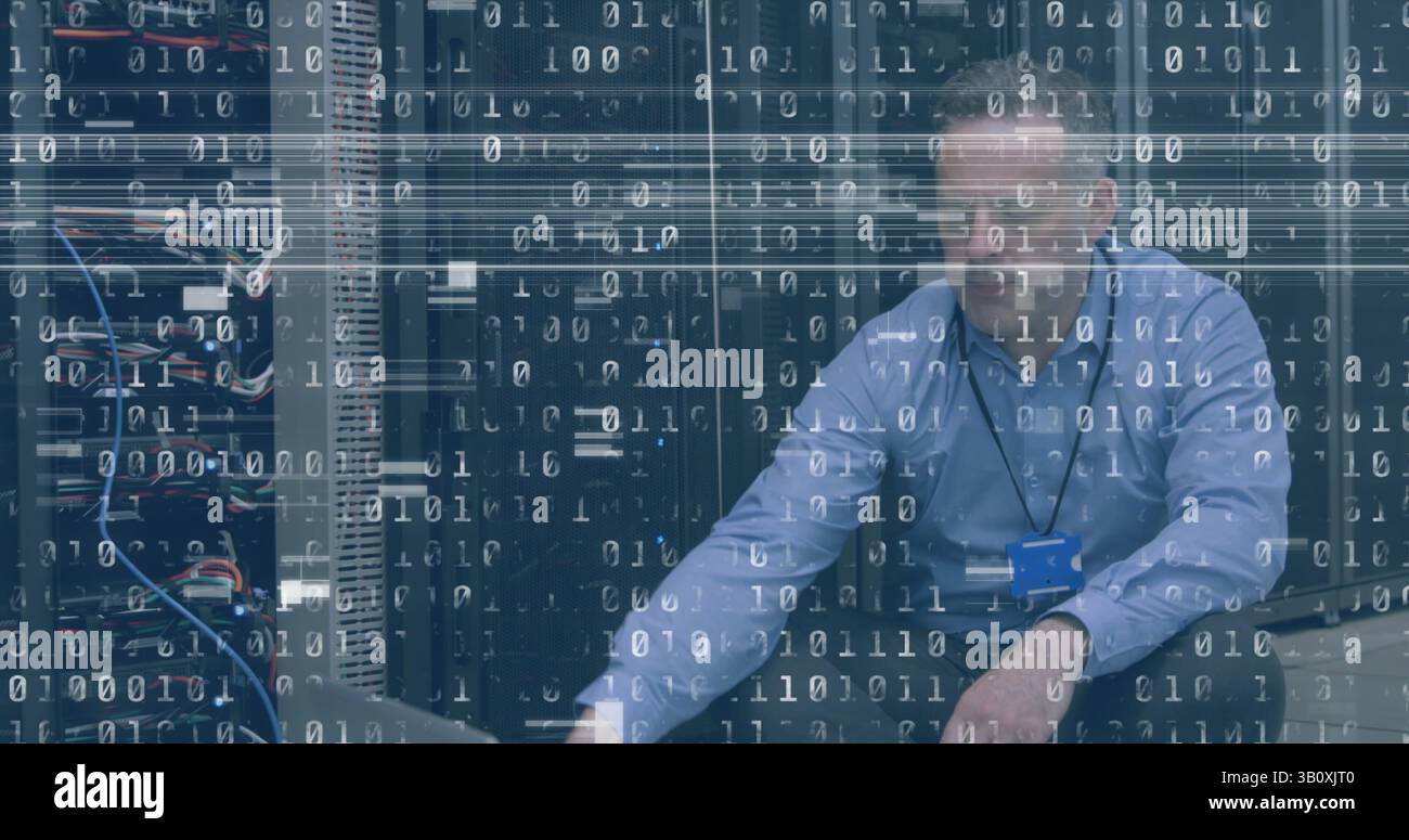 Image of interference and binary coding over caucasian man using laptop in server room Stock Photo