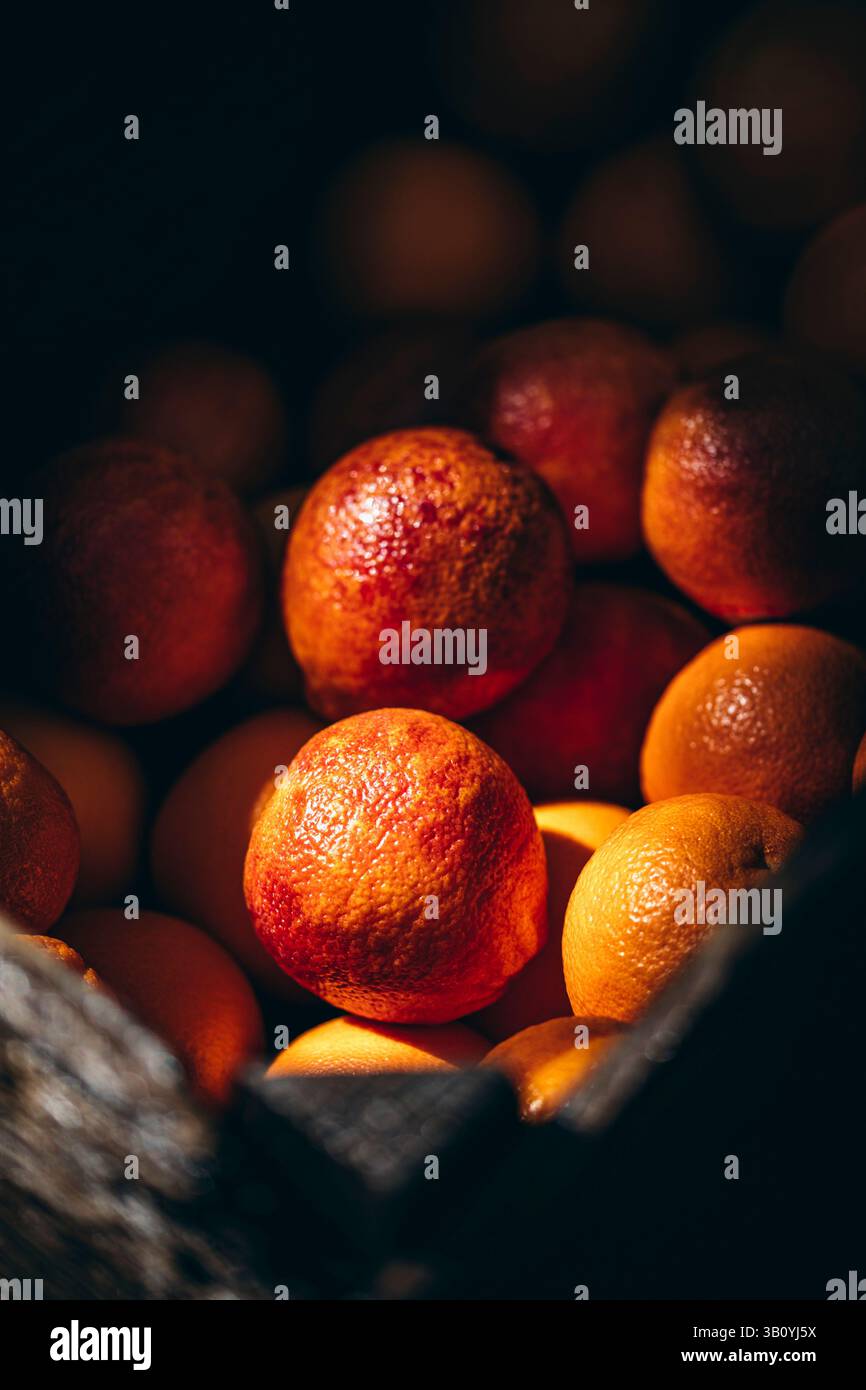 Blood oranges in a basket Stock Photo