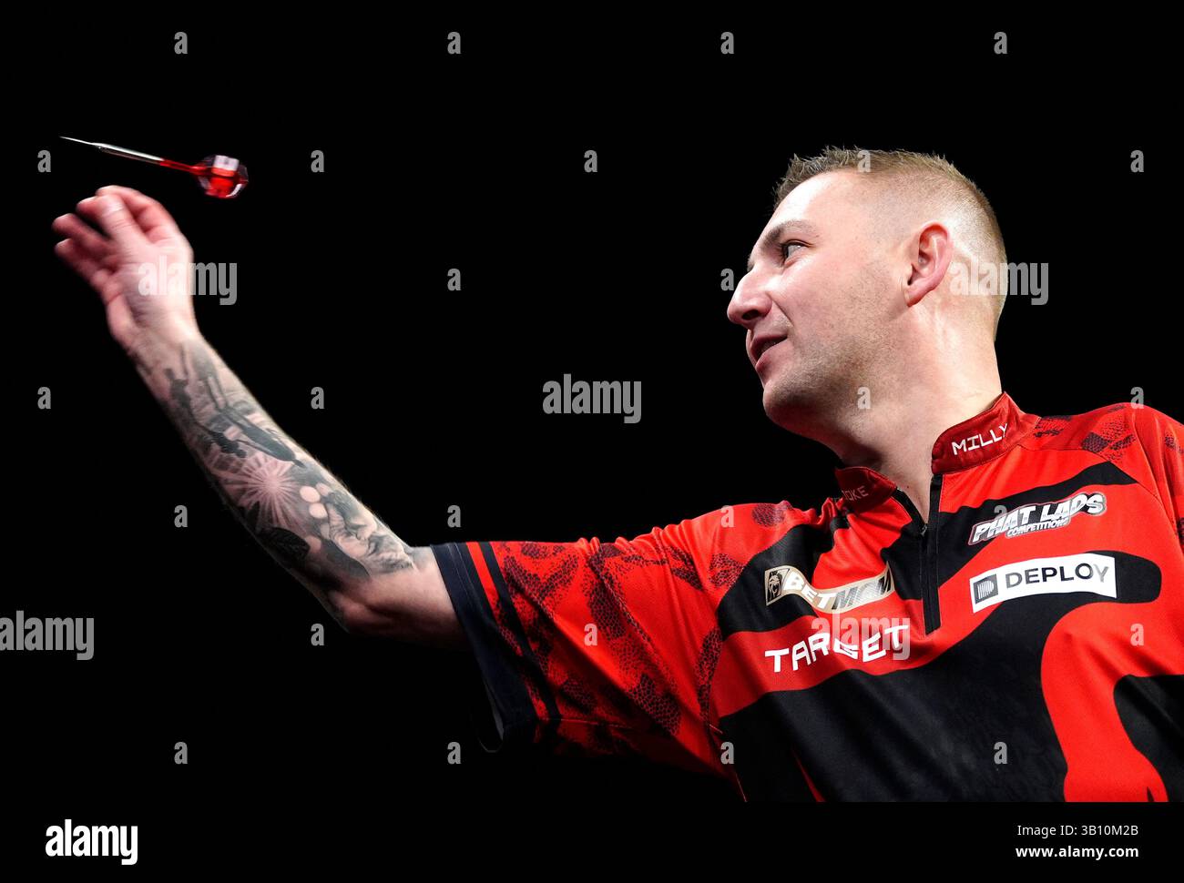 Nathan Aspinall in action against Luke Humphries (not pictured) during