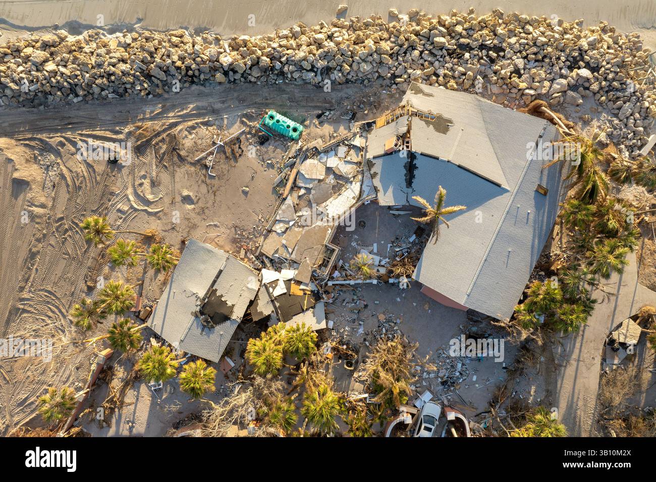 Destroyed house on ocean shore. Hurricane Milton consequences on Manasota Key, Florida. Storm surge severe damage Stock Photo