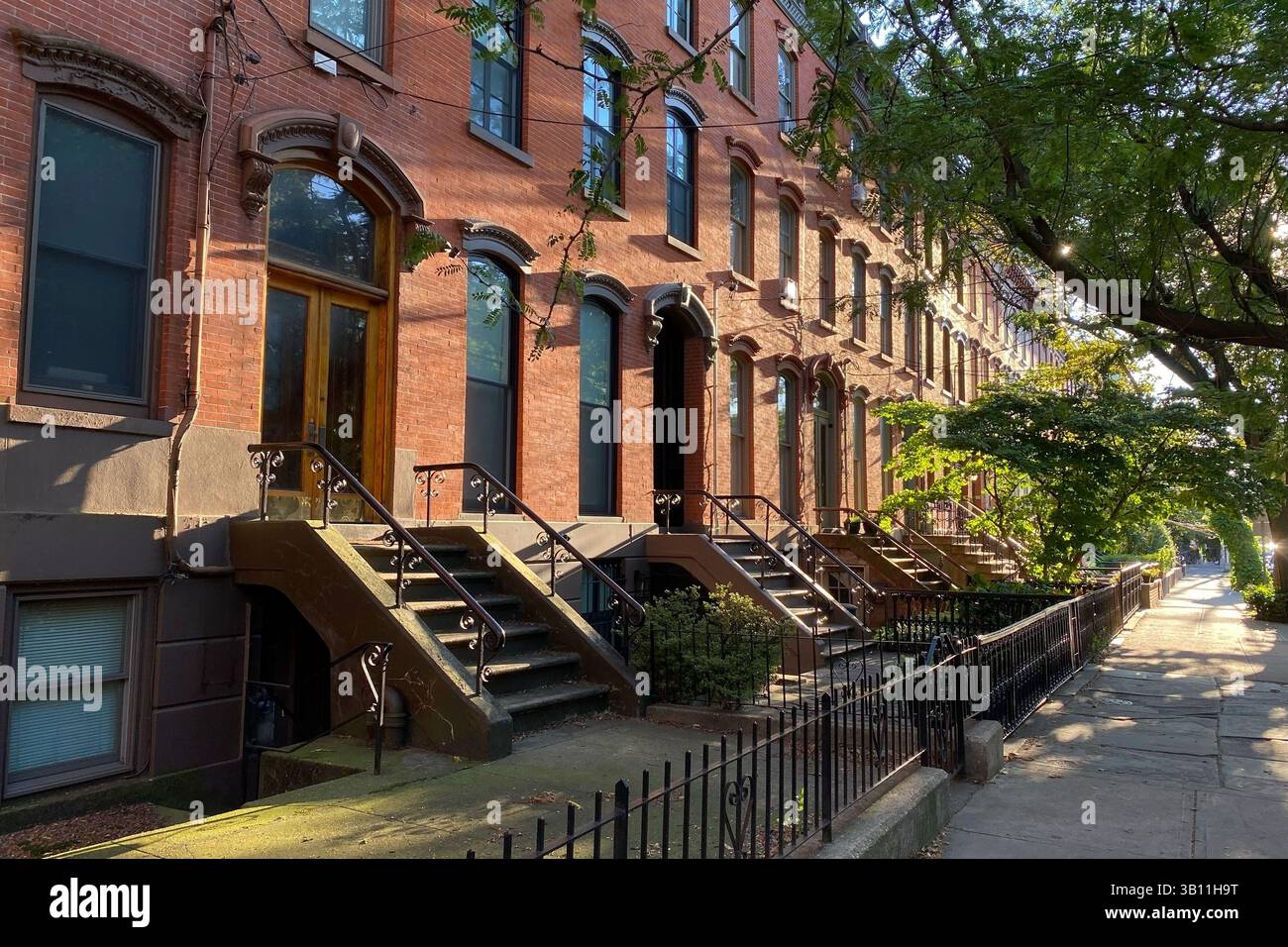 Photo inspiration: Urban Luxury Homes In Nyc Reference: Urban Brownstone Homes In Nyc With Elegant Brick Design Stock