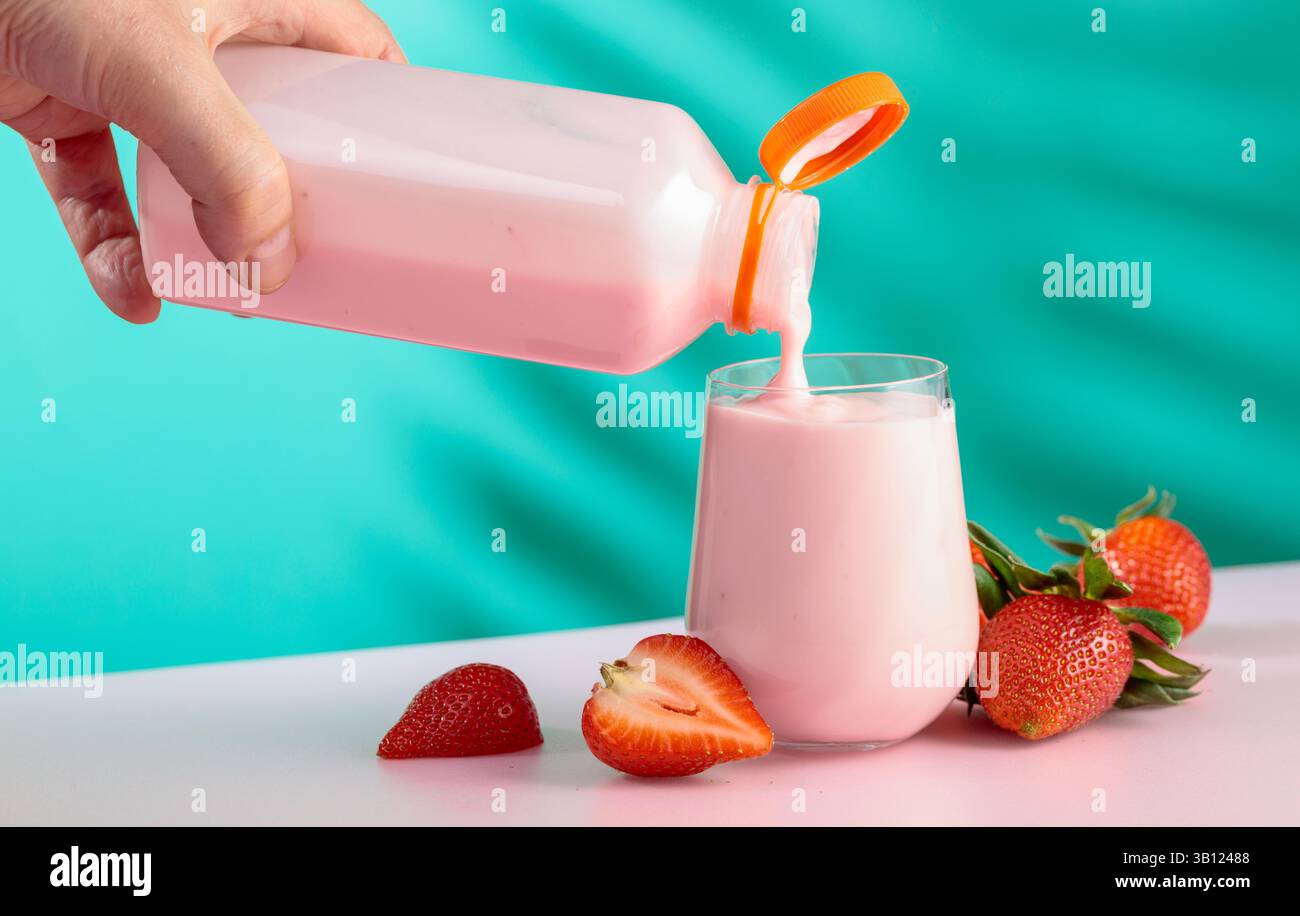 Strawberry milkshake smoothie and fresh berries. Smoothie, vitamin ...