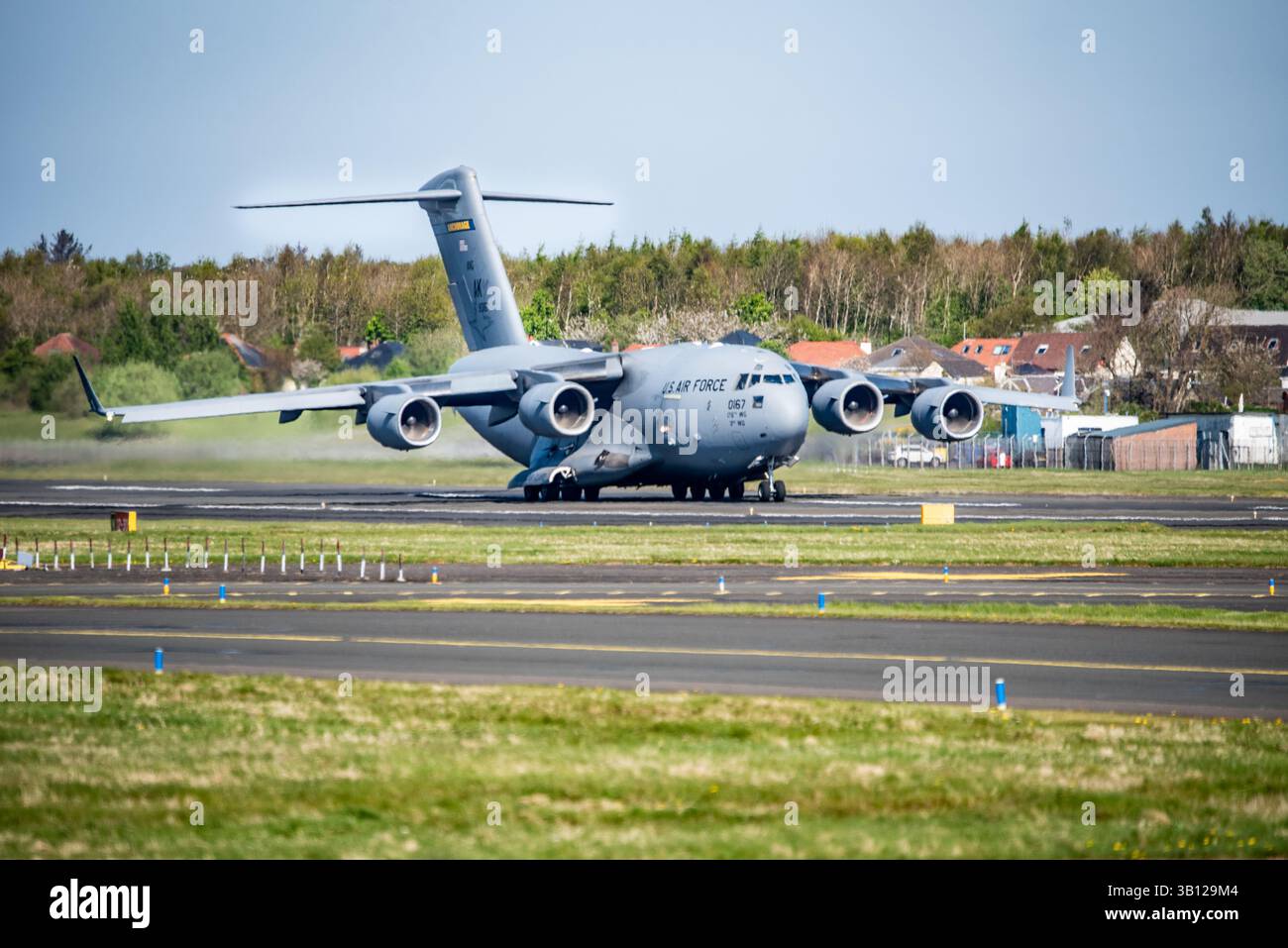 US Air Force Boeing C-17A Globemaster III preparing to take off Stock Photo