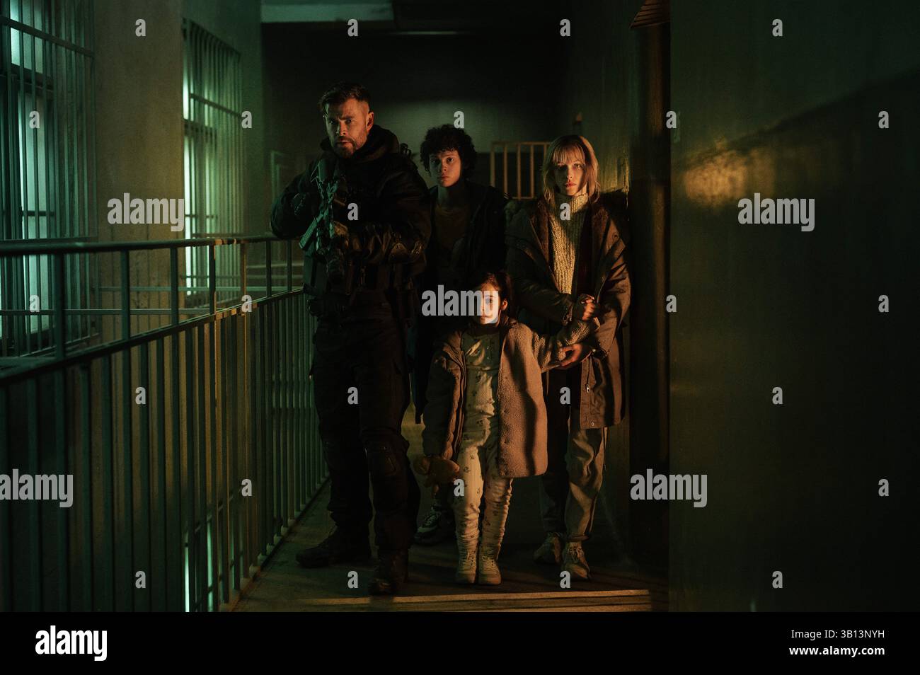 (L to R) Chris Hemsworth as Tyler Rake, Andro Jafaridze as Sandro ...