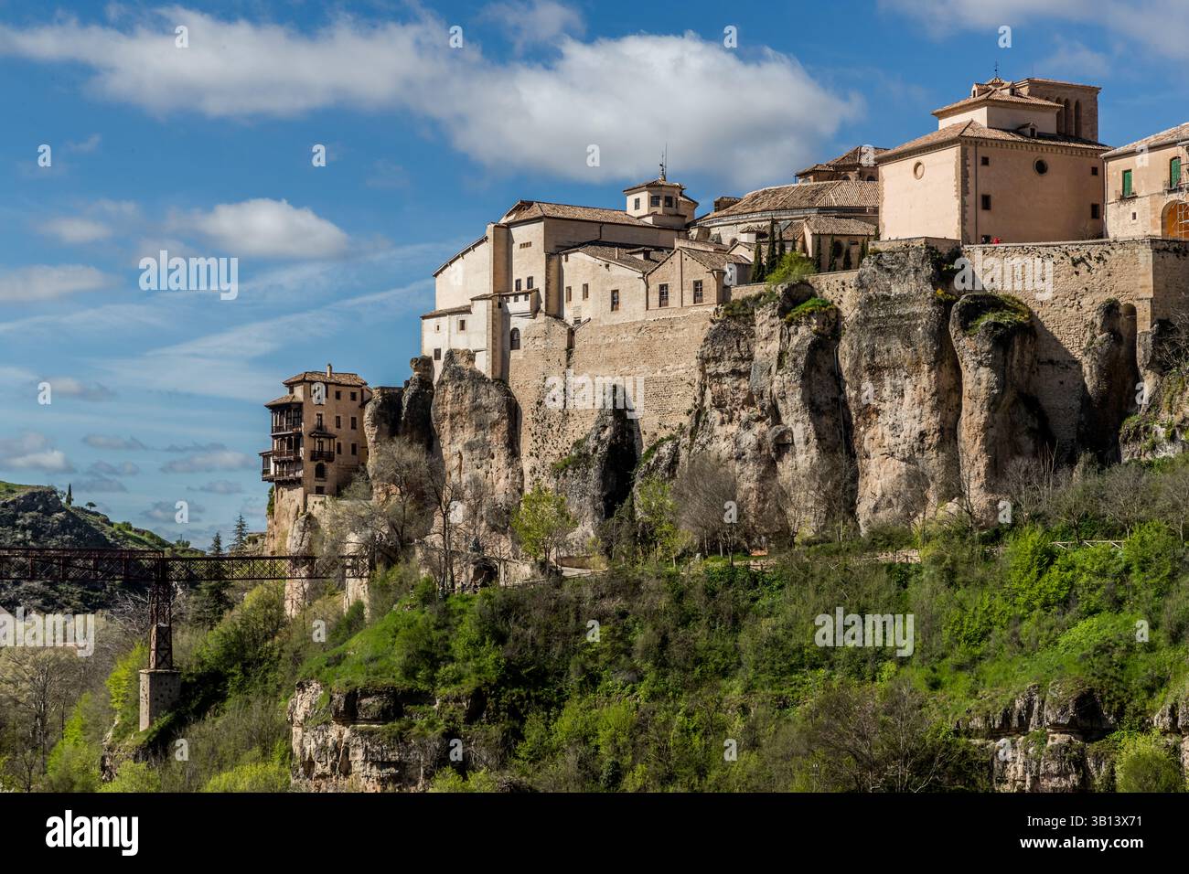 Panoramic view of Cuenca, Spain, with houses on the cliffs and a bridge leading to the Parador de Cuenca. Cuenca, Castilla-La Mancha, Spain Stock Photo
