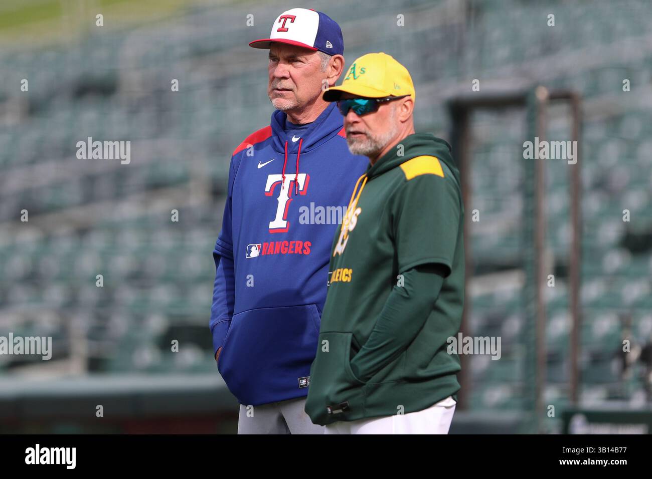 Texas Rangers manager Bruce Bochy, left, and Athletics manager Mark ...