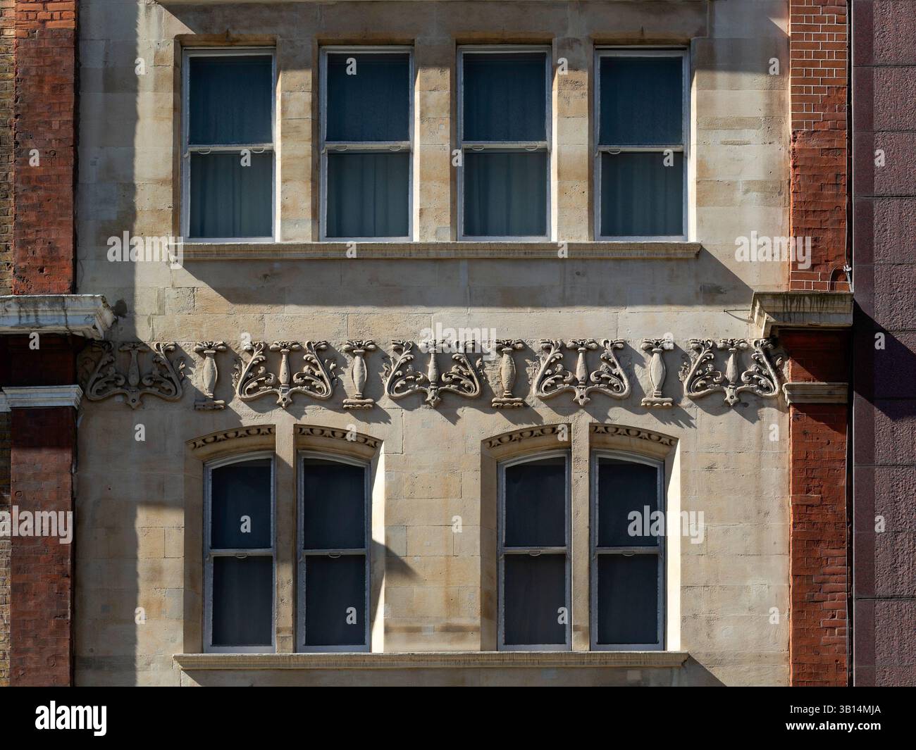 LONDON, UK - APRIL 01, 2025:  Ornate stone decoration on Victorian building at 6 City Road Stock Photo