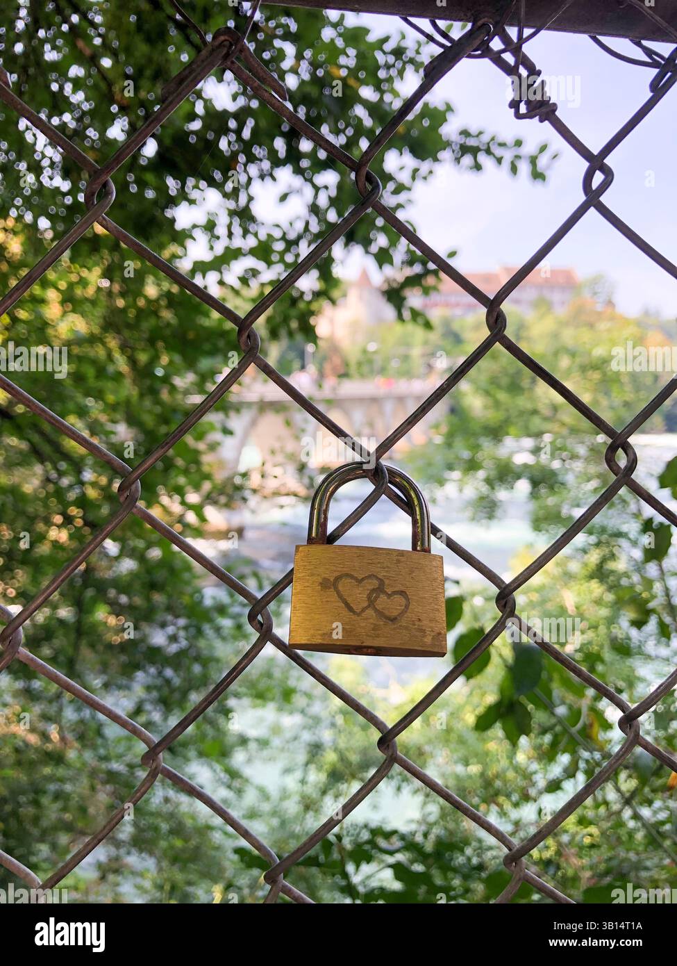 A love lock on a fence Stock Photo