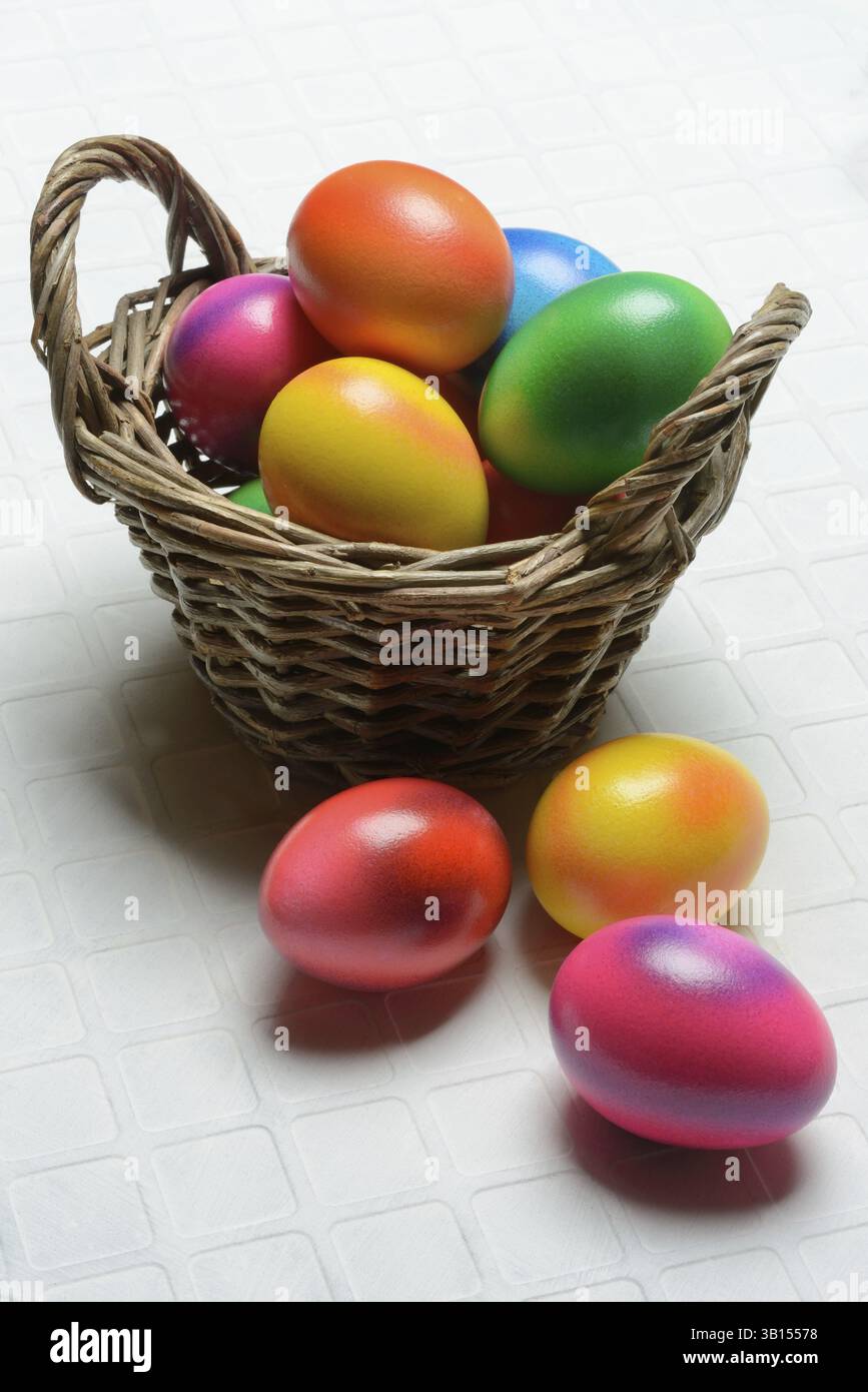 Colourful Easter eggs in baskets, Easter, Easter egg hunt Stock Photo