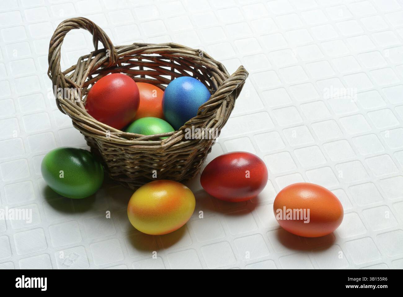 Colourful Easter eggs in baskets, Easter, Easter egg hunt Stock Photo